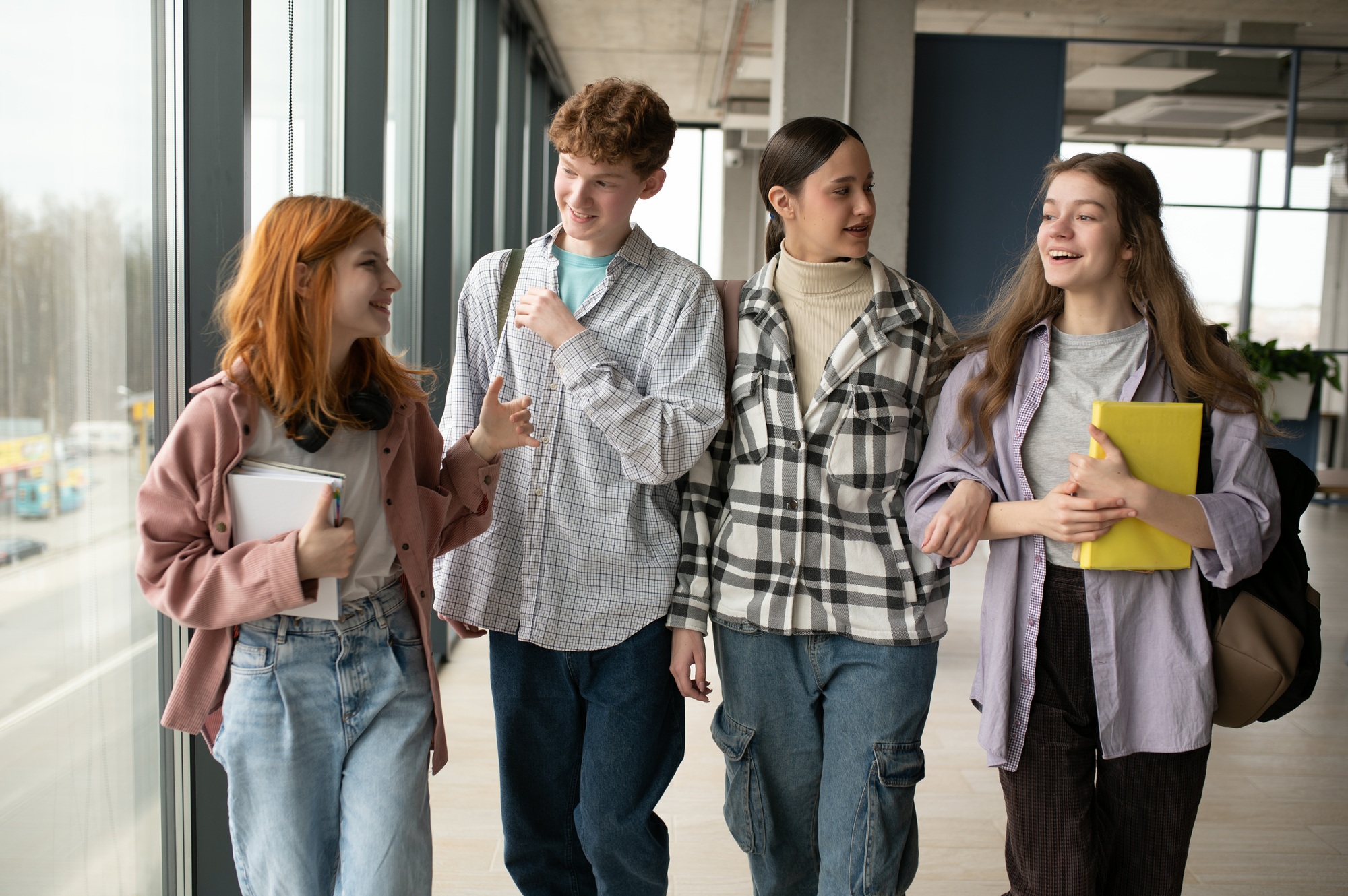 Happy high school students in the classroom